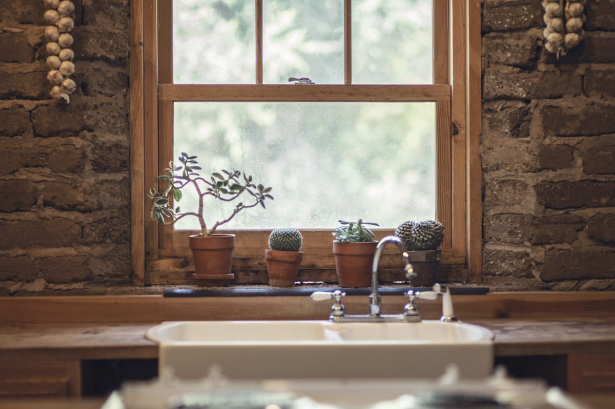 Tips for caring for a porcelain sink. Love the farmhouse sink and the  faucet with the pull-down sprayer!