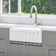 https://www.magnushomeproducts.com/cdn/shop/products/24-yovanny-fireclay-fluted-apron-single-bowl-farmhouse-sink-white-27949005275330_96x96_crop_center@2x.jpg?v=1614291634