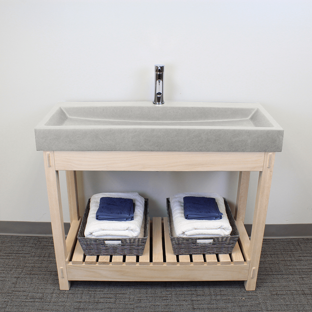 https://www.magnushomeproducts.com/cdn/shop/products/39-amador-rectangular-cast-concrete-vessel-sink-with-wood-stand-white-sandstone-23543631380674_1024x1024.png?v=1613414221